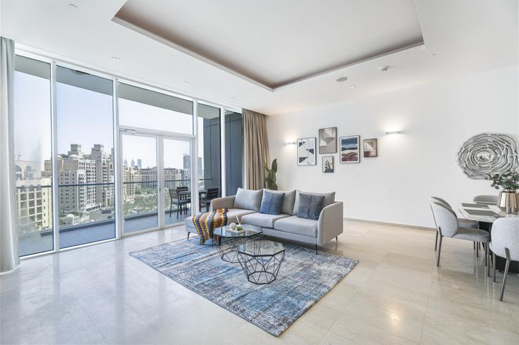 Elegantly designed living room with modern furnishings in an apartment at Building Tariaq Bedon Esm - dvh-holiday-homes-llc - 1312082 - DXB in The Palm Jumeirah, Dubai Elegantly designed living room with modern furnishings in an apartment at Building Tariaq Bedon Esm - dvh-holiday-homes-llc - 1312082 - DXB in The Palm Jumeirah, Dubai