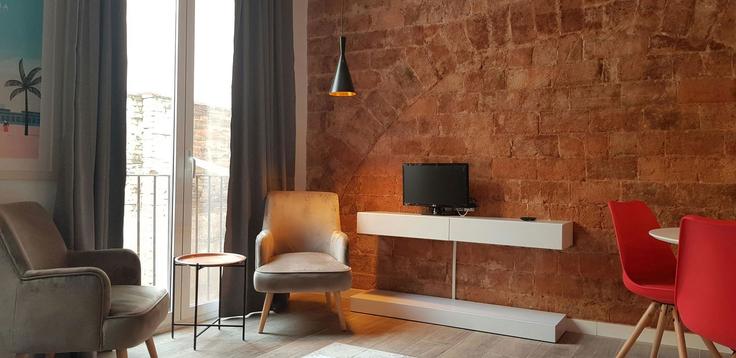 Elegante sala de estar con mobiliario moderno en un apartamento en Building Carrer dels Salvador - easyflat - 1251709 - BCN en Ciutat Vella, Barcelona