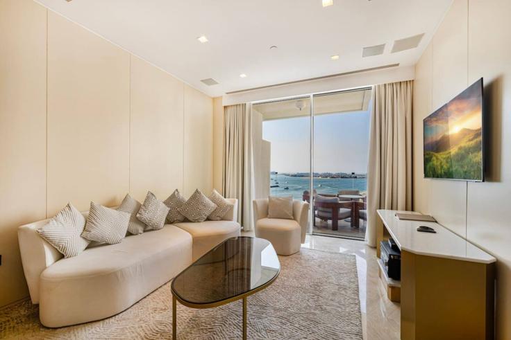 Elegantly designed living room with modern furnishings in an apartment at Building Tariaq Bedon Esm - elegant-homes - 1509464 in The Palm Jumeirah, Dubai