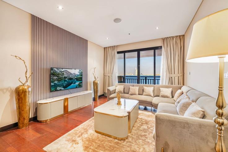 Elegantly designed living room with modern furnishings in an apartment at Building Tariaq Bedon Esm - elegant-homes - 1509467 in The Palm Jumeirah, Dubai