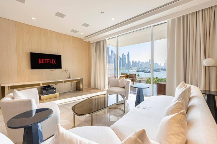 Elegantly designed living room with modern furnishings in an apartment at Building Tariaq Bedon Esm - elegant-homes - 1509482 in The Palm Jumeirah, Dubai