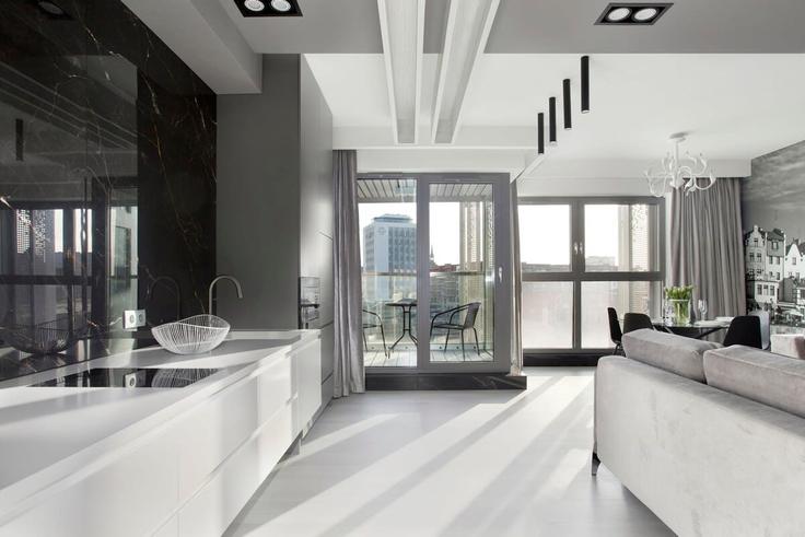 Sala de estar elegantemente projetada com móveis modernos em um apartamento no Building Chmielna - elite-apartments - 1320040 em Gdańsk, Gdańsk Sala de estar elegantemente projetada com móveis modernos em um apartamento no Building Chmielna - elite-apartments - 1320040 em Gdańsk, Gdańsk