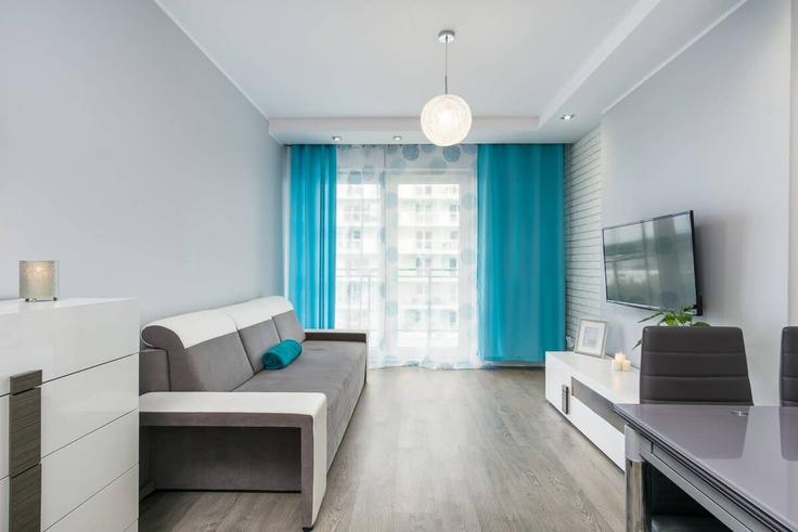Gdańsk, Gdańsk에 위치한 Building Przymorze wielkie - elite-apartments - 1319987 유닛의 세련된 인테리어가 돋보이는 거실 Gdańsk, Gdańsk에 위치한 Building Przymorze wielkie - elite-apartments - 1319987 유닛의 세련된 인테리어가 돋보이는 거실