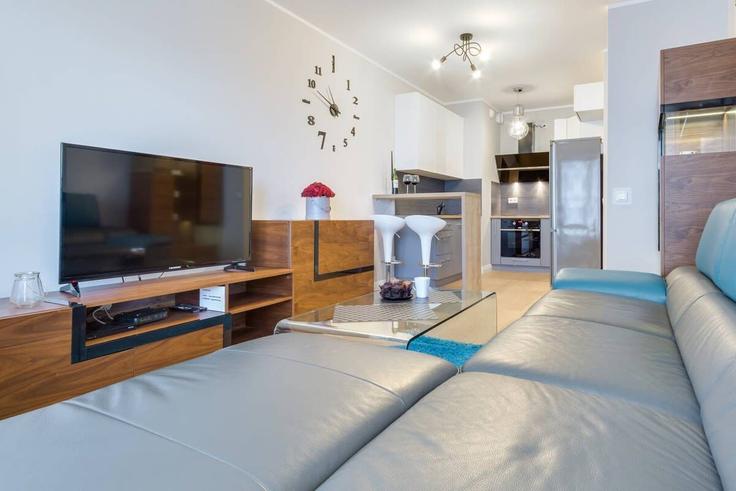Salle de séjour élégante avec mobilier moderne dans un appartement à Building Przymorze wielkie - elite-apartments - 1320194 à Gdańsk, Gdańsk