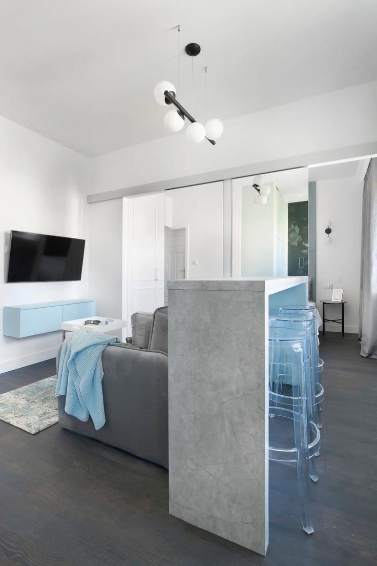 Salle de séjour élégante avec mobilier moderne dans un appartement à Building Kozia - elite-apartments - 1320012 à Gdańsk, Gdańsk Salle de séjour élégante avec mobilier moderne dans un appartement à Building Kozia - elite-apartments - 1320012 à Gdańsk, Gdańsk