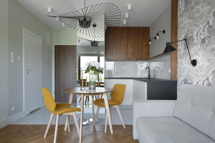Salle de séjour élégante avec mobilier moderne dans un appartement à Building Jaglana - elite-apartments - 1320201 à Gdańsk, Gdańsk Salle de séjour élégante avec mobilier moderne dans un appartement à Building Jaglana - elite-apartments - 1320201 à Gdańsk, Gdańsk