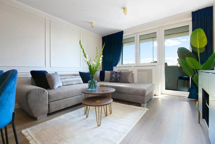 Salle de séjour élégante avec mobilier moderne dans un appartement à Building Podwale Staromiejskie - elite-apartments - 1320119 à Gdańsk, Gdańsk Salle de séjour élégante avec mobilier moderne dans un appartement à Building Podwale Staromiejskie - elite-apartments - 1320119 à Gdańsk, Gdańsk