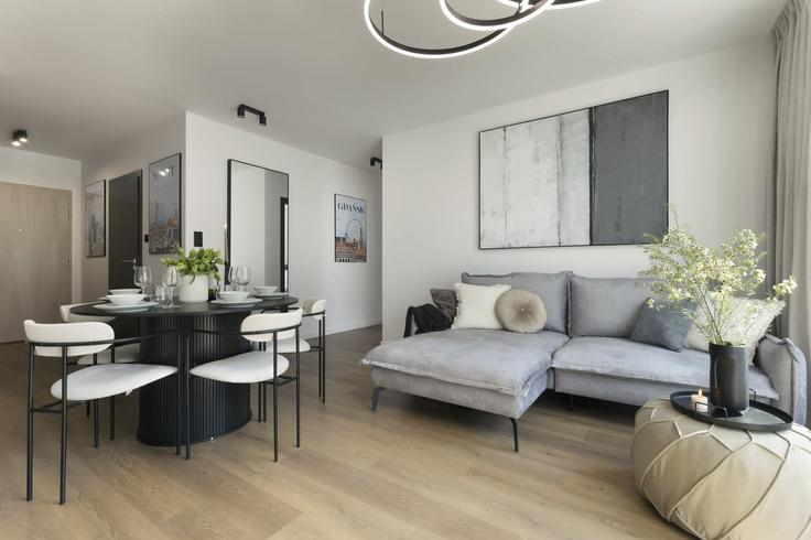 Gdańsk GdańskのBuilding Starowiejska - elite-apartments - 1320099のアパートメントにある、モダンな家具を備えたエレガントなデザインのリビングルーム Gdańsk GdańskのBuilding Starowiejska - elite-apartments - 1320099のアパートメントにある、モダンな家具を備えたエレガントなデザインのリビングルーム