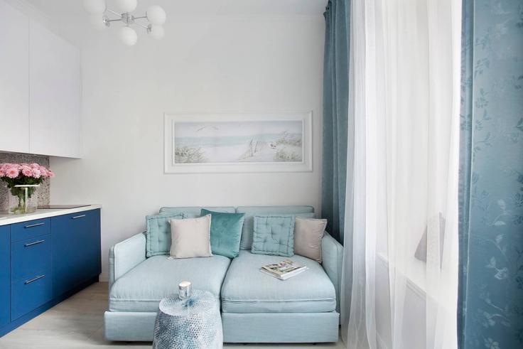 Sala de estar elegantemente projetada com móveis modernos em um apartamento no Building Ogarna - elite-apartments - 1320095 em Gdańsk, Gdańsk Sala de estar elegantemente projetada com móveis modernos em um apartamento no Building Ogarna - elite-apartments - 1320095 em Gdańsk, Gdańsk