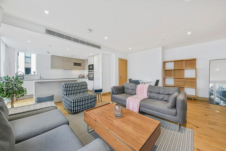 Elegante sala de estar con mobiliario moderno en un apartamento en Building North Wharf Road - elysianhouse - 1253751 - LON en City of Westminster, London Elegante sala de estar con mobiliario moderno en un apartamento en Building North Wharf Road - elysianhouse - 1253751 - LON en City of Westminster, London