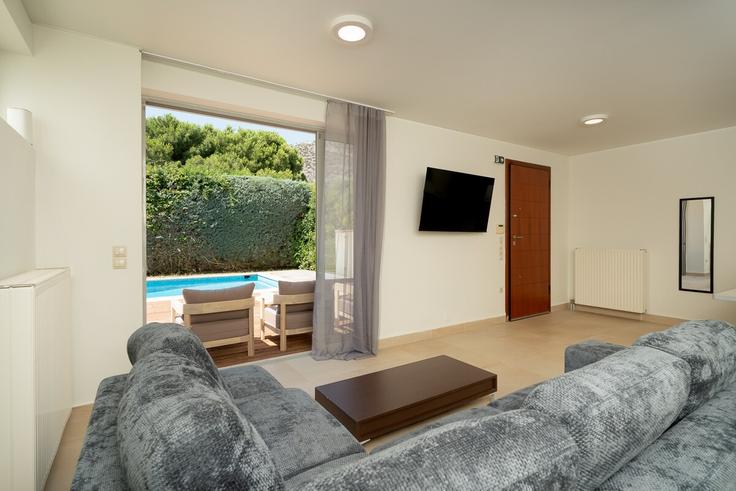 Elegant gestaltetes Wohnzimmer mit moderner Einrichtung in einer Wohnung im Building Leoforos Eleftheriou Venizelou - elysium-estates - 1582392 in East Athens, Athens Elegant gestaltetes Wohnzimmer mit moderner Einrichtung in einer Wohnung im Building Leoforos Eleftheriou Venizelou - elysium-estates - 1582392 in East Athens, Athens