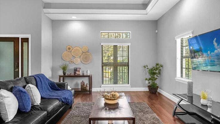 Sala de estar elegantemente projetada com móveis modernos em um apartamento no Building Damai Lane - enchantedgardens - 1019305 - MCO em Orlando, Orlando Sala de estar elegantemente projetada com móveis modernos em um apartamento no Building Damai Lane - enchantedgardens - 1019305 - MCO em Orlando, Orlando