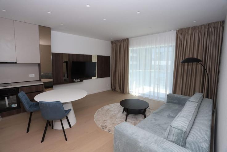 Sala de estar elegantemente projetada com móveis modernos em um apartamento no Building Bulevardul Dimitrie Pompeiu - eom-srl - 1581186 em Bucharest, Bucharest Sala de estar elegantemente projetada com móveis modernos em um apartamento no Building Bulevardul Dimitrie Pompeiu - eom-srl - 1581186 em Bucharest, Bucharest