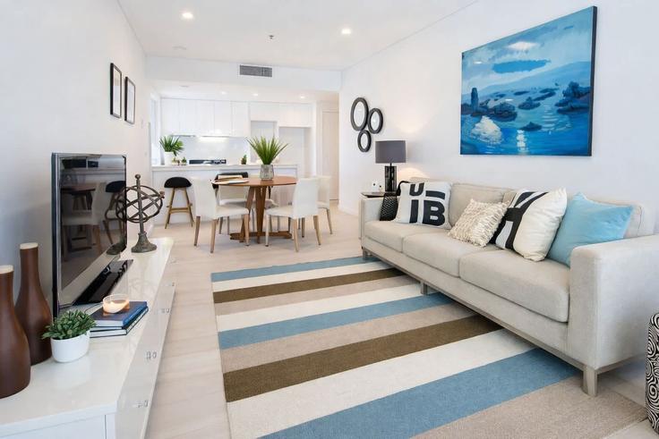 Elegant gestaltetes Wohnzimmer mit moderner Einrichtung in einer Wohnung im Building Stratton Street - epic-stays - 1241418 - AUS in Newstead, Brisbane Elegant gestaltetes Wohnzimmer mit moderner Einrichtung in einer Wohnung im Building Stratton Street - epic-stays - 1241418 - AUS in Newstead, Brisbane