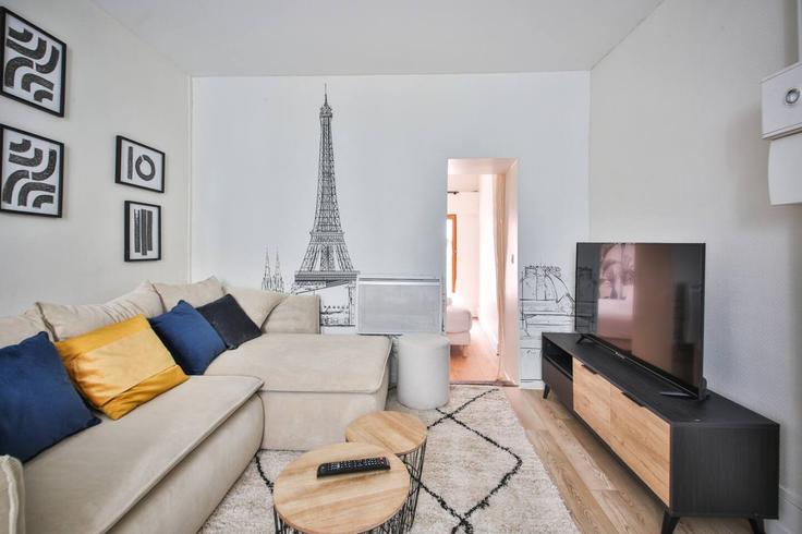 Paris 15th arrondissementのBuilding Rue Lecourbe - evengestion - 1044837 - PARのアパートメントにある、モダンな家具を備えたエレガントなデザインのリビングルーム Paris 15th arrondissementのBuilding Rue Lecourbe - evengestion - 1044837 - PARのアパートメントにある、モダンな家具を備えたエレガントなデザインのリビングルーム
