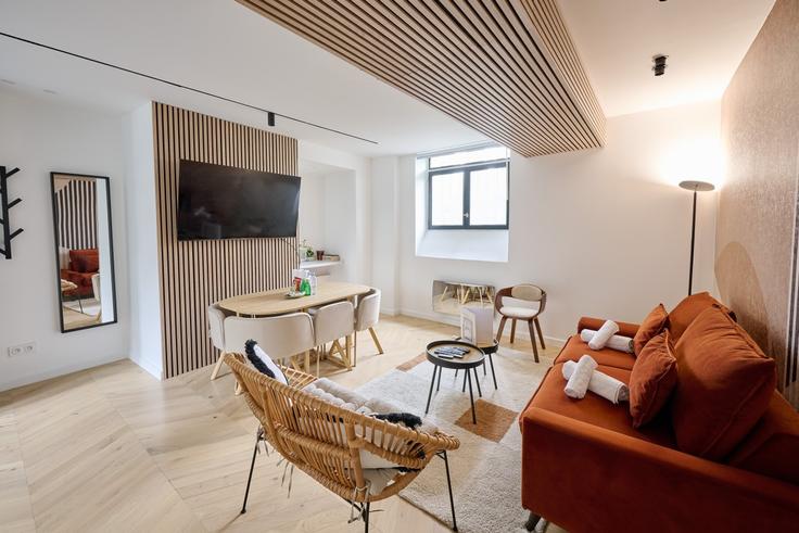 Salle de séjour élégante avec mobilier moderne dans un appartement à Building Rue Scipion - evengestion - 1044901 - PAR à 5th arrondissement, Paris Salle de séjour élégante avec mobilier moderne dans un appartement à Building Rue Scipion - evengestion - 1044901 - PAR à 5th arrondissement, Paris