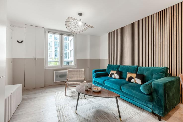 Sala de estar elegantemente projetada com móveis modernos em um apartamento no Building Rue Saint-Marc - evengestion - 1062654 - PAR em 2nd arrondissement, Paris Sala de estar elegantemente projetada com móveis modernos em um apartamento no Building Rue Saint-Marc - evengestion - 1062654 - PAR em 2nd arrondissement, Paris