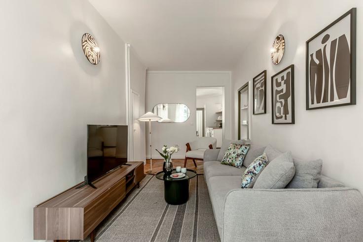 Sala de estar elegantemente projetada com móveis modernos em um apartamento no Building Rue Saint-Marc - evengestion - 1062659 - PAR em 2nd arrondissement, Paris Sala de estar elegantemente projetada com móveis modernos em um apartamento no Building Rue Saint-Marc - evengestion - 1062659 - PAR em 2nd arrondissement, Paris