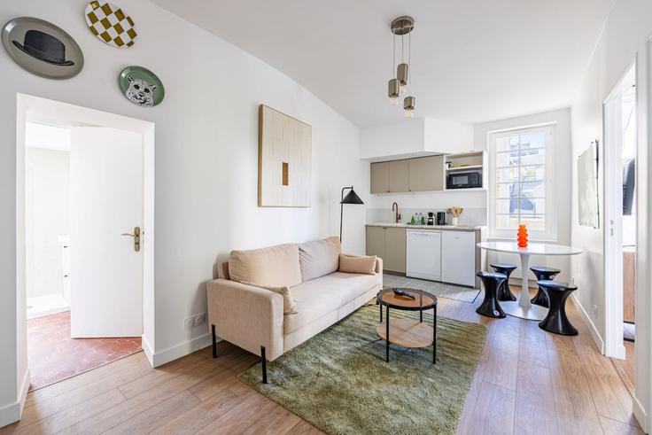 Elegantly designed living room with modern furnishings in an apartment at Building Rue Mouffetard - evengestion - 1093284 - PAR in 5th arrondissement, Paris Elegantly designed living room with modern furnishings in an apartment at Building Rue Mouffetard - evengestion - 1093284 - PAR in 5th arrondissement, Paris