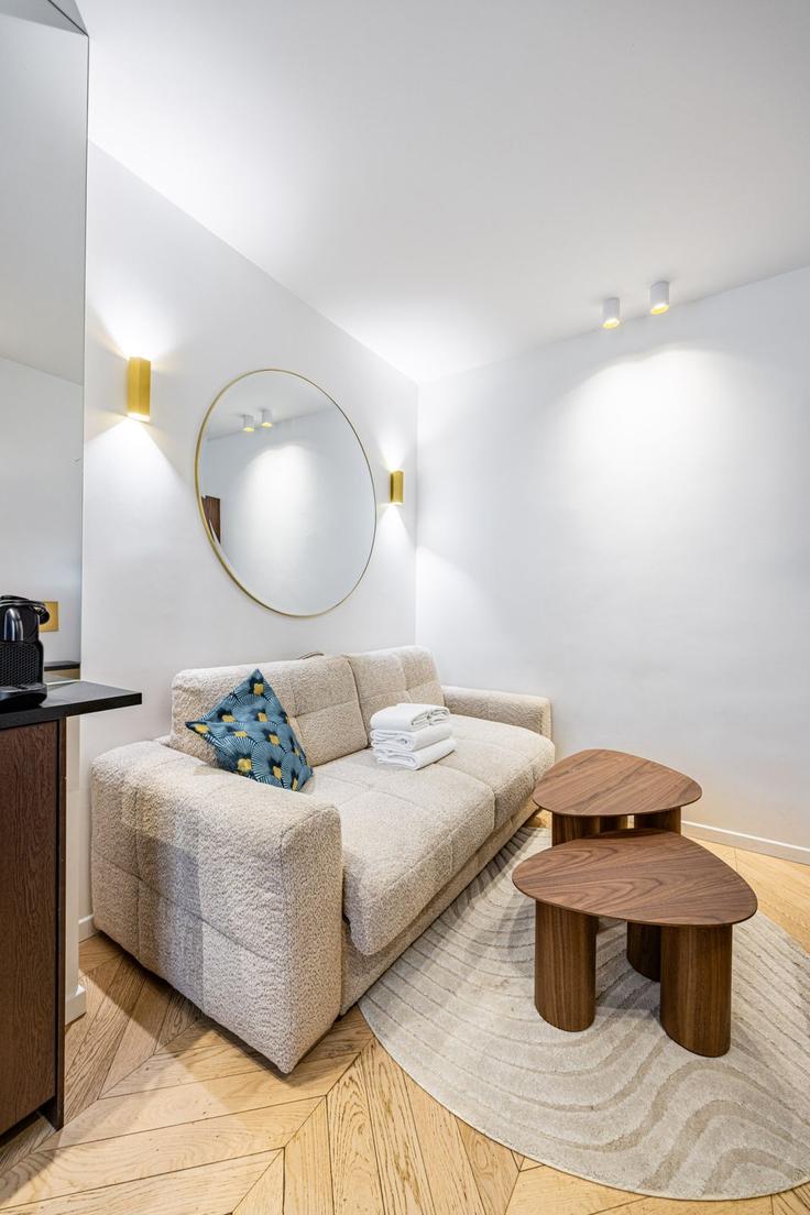 Elegantly designed living room with modern furnishings in an apartment at Building Rue des Vignoles - evengestion - 1239556 - PAR in 20th arrondissement of Paris, Paris