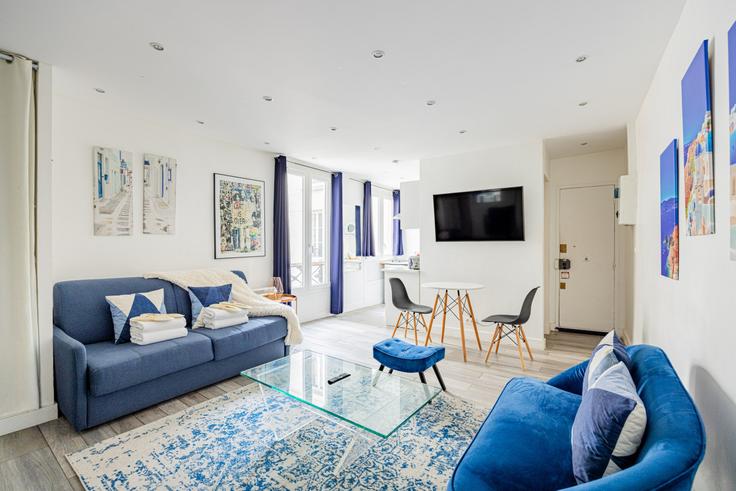 Elegant gestaltetes Wohnzimmer mit moderner Einrichtung in einer Wohnung im Building Square Claude Debussy - evengestion - 1250878 - PAR in 17th arrondissement, Paris