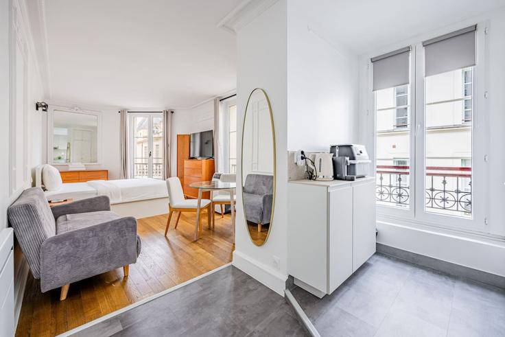 Elegantly designed living room with modern furnishings in an apartment at Building Rue de Sévigné - evengestion - 1273075 - PAR in 3rd arrondissement, Paris