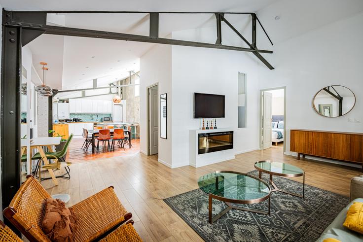 Elegantly designed living room with modern furnishings in an apartment at Building Rue de Paradis - evengestion - 1511288 in 10th arrondissement, Paris