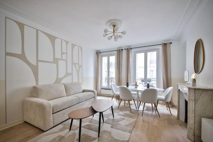 Elegante sala de estar con mobiliario moderno en un apartamento en Building Place du Commerce - evengestion - 1585487 en 15th arrondissement, Paris Elegante sala de estar con mobiliario moderno en un apartamento en Building Place du Commerce - evengestion - 1585487 en 15th arrondissement, Paris