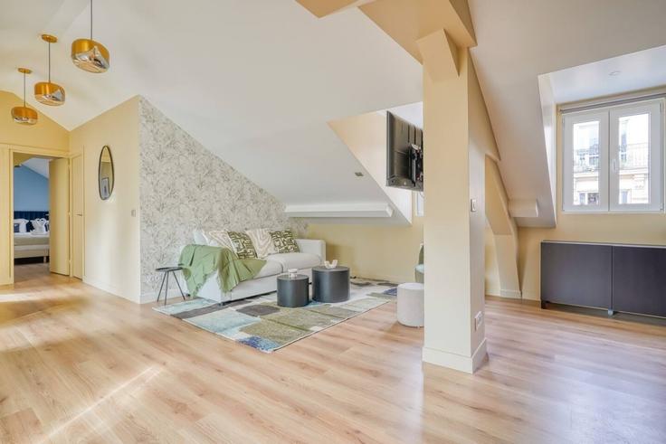 Sala de estar elegantemente projetada com móveis modernos em um apartamento no Building Place du Commerce - evengestion - 1604814 em 15th arrondissement, Paris Sala de estar elegantemente projetada com móveis modernos em um apartamento no Building Place du Commerce - evengestion - 1604814 em 15th arrondissement, Paris