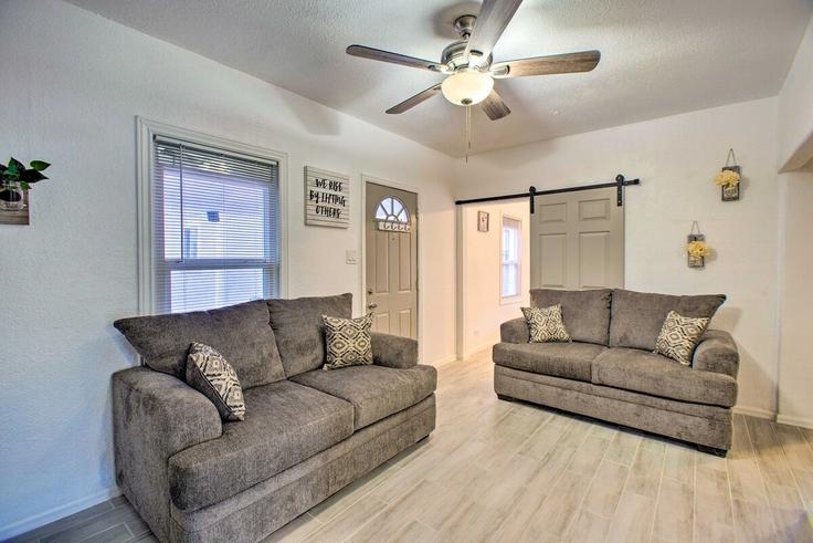 Elegantly designed living room with modern furnishings in an apartment at Building Utica Street - evolve - 1386124 in Denver, Denver