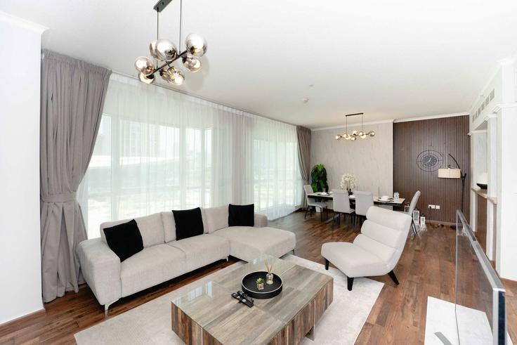 Elegante sala de estar con mobiliario moderno en un apartamento en Building 29 Burj Dubai Boulevard - fam-living - 1644521 en Burj Khalifa, Dubai Elegante sala de estar con mobiliario moderno en un apartamento en Building 29 Burj Dubai Boulevard - fam-living - 1644521 en Burj Khalifa, Dubai