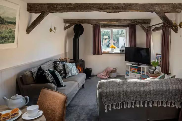Elegante sala de estar con mobiliario moderno en un apartamento en Building Nutcombe Hill - finest-retreats - 1330075 en North Devon District, Ilfracombe Elegante sala de estar con mobiliario moderno en un apartamento en Building Nutcombe Hill - finest-retreats - 1330075 en North Devon District, Ilfracombe