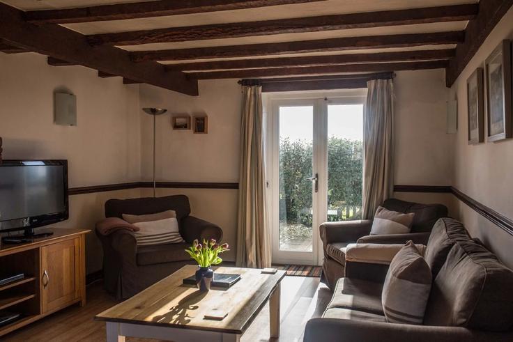Torridge District, Bideford에 위치한 Building Cheristow Farm Cottages - finest-retreats - 1696493 유닛의 세련된 인테리어가 돋보이는 거실 Torridge District, Bideford에 위치한 Building Cheristow Farm Cottages - finest-retreats - 1696493 유닛의 세련된 인테리어가 돋보이는 거실