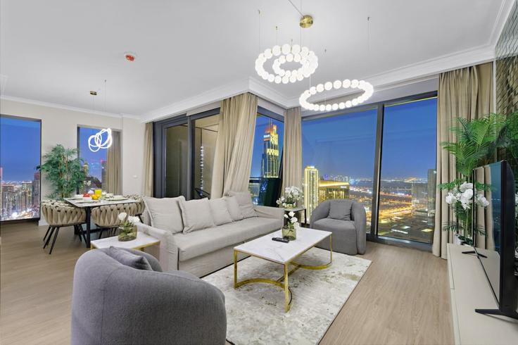 Salle de séjour élégante avec mobilier moderne dans un appartement à Building Sheikh Mohammed bin Rashid Boulevard - first-class - 1336288 à Downtown Dubai, Dubai Salle de séjour élégante avec mobilier moderne dans un appartement à Building Sheikh Mohammed bin Rashid Boulevard - first-class - 1336288 à Downtown Dubai, Dubai