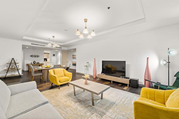 Elegantly designed living room with modern furnishings in an apartment at Building Al Sukook Street - first-class - 1336375 in Trade Center, Dubai Elegantly designed living room with modern furnishings in an apartment at Building Al Sukook Street - first-class - 1336375 in Trade Center, Dubai