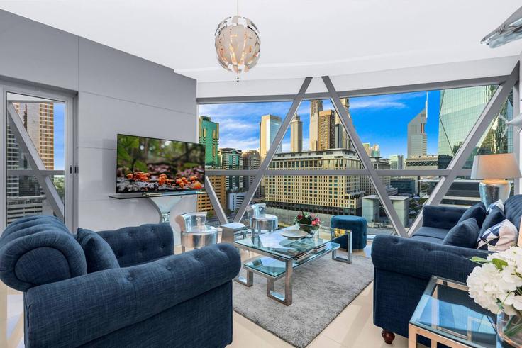 Elegantly designed living room with modern furnishings in an apartment at Building Tariaq Bedon Esm - first-class - 1336480 in Trade Center, Dubai Elegantly designed living room with modern furnishings in an apartment at Building Tariaq Bedon Esm - first-class - 1336480 in Trade Center, Dubai