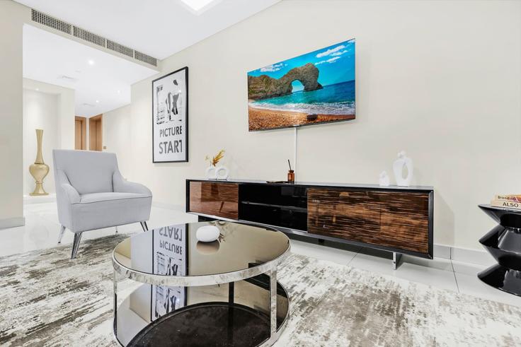 Elegantly designed living room with modern furnishings in an apartment at Building Tariaq Bedon Esm - first-class - 1336483 in Business Bay, Dubai Elegantly designed living room with modern furnishings in an apartment at Building Tariaq Bedon Esm - first-class - 1336483 in Business Bay, Dubai
