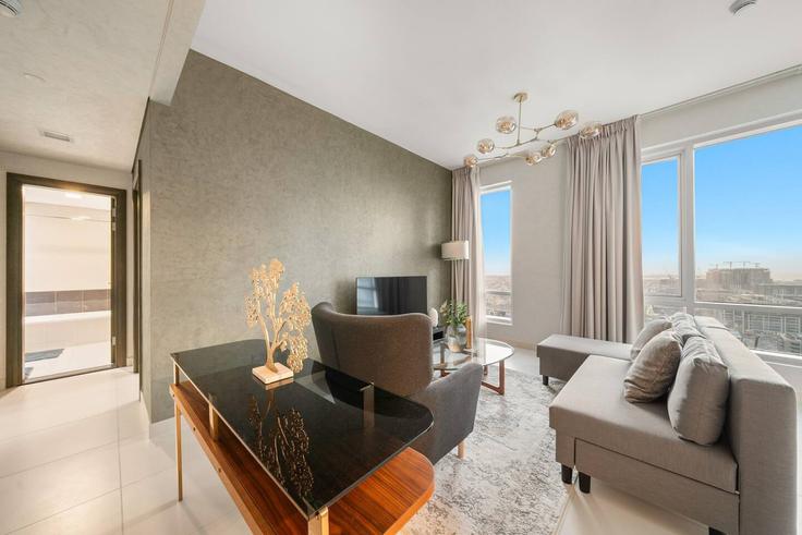 Downtown Dubai, Dubai 소재 Building Sh Mohammed Bin Rashid Blvd - first-class - 1336526 유닛에 마련된, 현대적인 가구로 꾸며진 우아한 디자인의 거실 Downtown Dubai, Dubai 소재 Building Sh Mohammed Bin Rashid Blvd - first-class - 1336526 유닛에 마련된, 현대적인 가구로 꾸며진 우아한 디자인의 거실