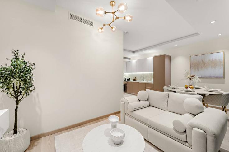 Dubai Downtown DubaiのBuilding Tariaq Bedon Esm - first-class - 1336647のアパートメントにある、モダンな家具を備えたエレガントなデザインのリビングルーム Dubai Downtown DubaiのBuilding Tariaq Bedon Esm - first-class - 1336647のアパートメントにある、モダンな家具を備えたエレガントなデザインのリビングルーム