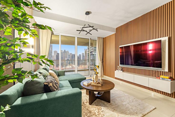 Elegant gestaltetes Wohnzimmer mit moderner Einrichtung in einer Wohnung im Building Cluster A - first-class - 1336706 in JLT, Dubai