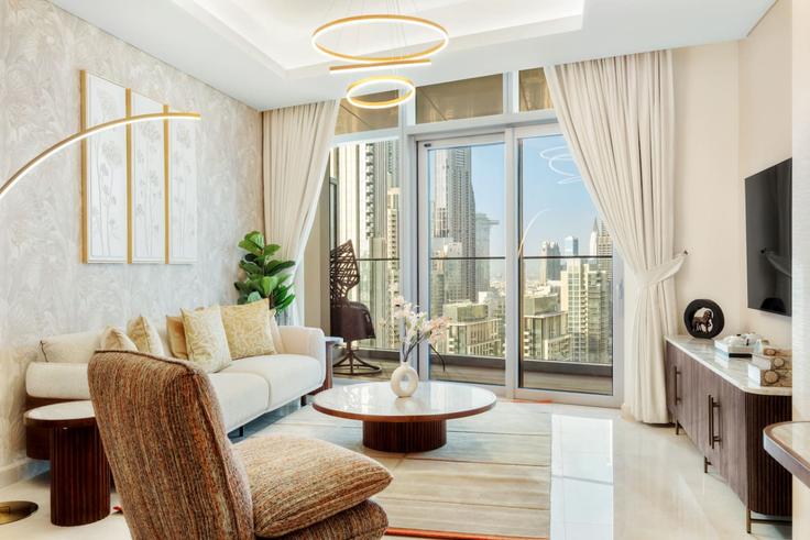 Salle de séjour élégante avec mobilier moderne dans un appartement à Building Burj Khalifa Boulevard - first-class - 1366714 à Burj Khalifa, Dubai Salle de séjour élégante avec mobilier moderne dans un appartement à Building Burj Khalifa Boulevard - first-class - 1366714 à Burj Khalifa, Dubai