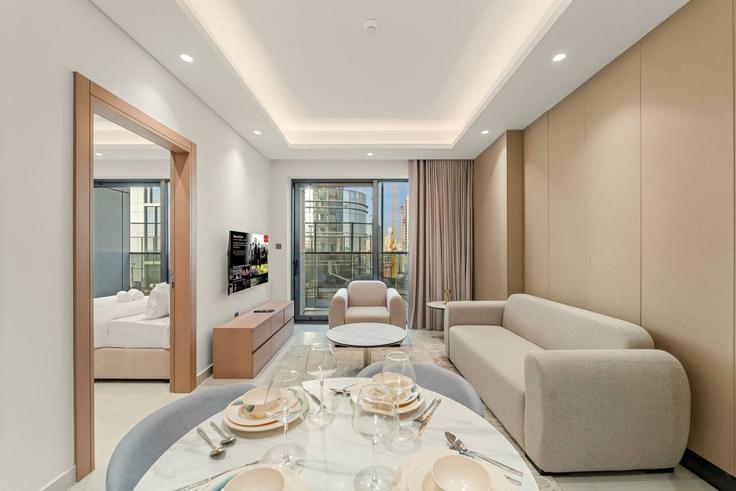 Salle de séjour élégante avec mobilier moderne dans un appartement à Building Orchid St - first-class - 1468235 à Al Barsha South Fifth, Dubai Salle de séjour élégante avec mobilier moderne dans un appartement à Building Orchid St - first-class - 1468235 à Al Barsha South Fifth, Dubai