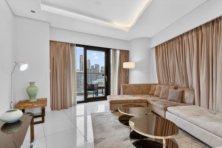 Elegantly designed living room with modern furnishings in an apartment at Building Tariaq Bedon Esm - first-class - 1512414 in Business Bay, Dubai