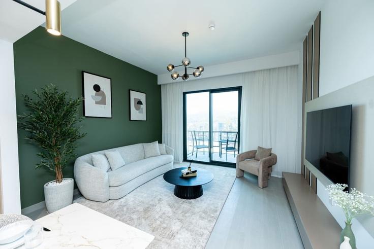Elegante sala de estar con mobiliario moderno en un apartamento en Building Ras Al Khor Road - first-class - 1638502 en Al Merkadh, Dubai Elegante sala de estar con mobiliario moderno en un apartamento en Building Ras Al Khor Road - first-class - 1638502 en Al Merkadh, Dubai