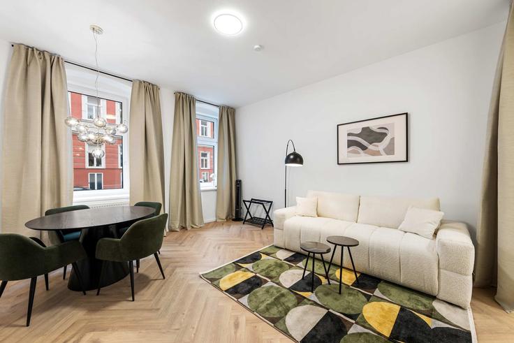 Salle de séjour élégante avec mobilier moderne dans un appartement à Building Jadengasse - flexi-flats-management-gmbh - 1613610 à Vienna, Vienna Salle de séjour élégante avec mobilier moderne dans un appartement à Building Jadengasse - flexi-flats-management-gmbh - 1613610 à Vienna, Vienna