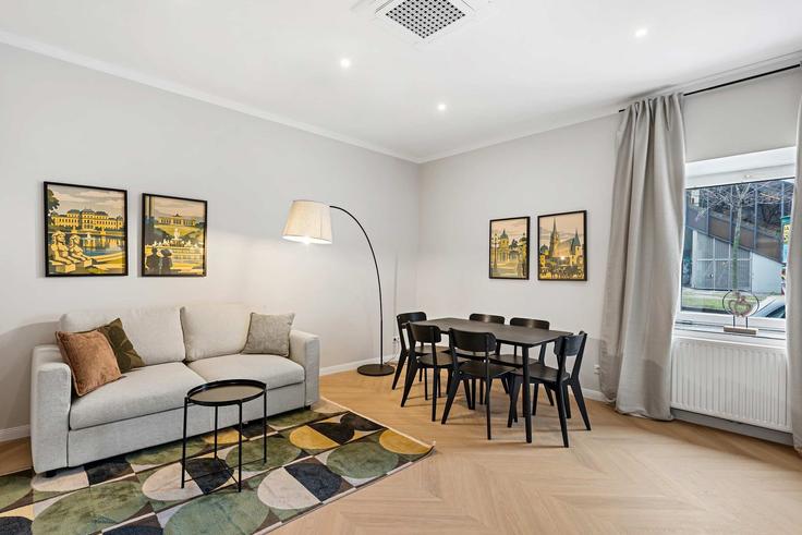 Vienna ViennaのBuilding Lerchenfelder Gürtel - flexi-flats-management-gmbh - 1613542のアパートメントにある、モダンな家具を備えたエレガントなデザインのリビングルーム