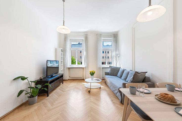 Salle de séjour élégante avec mobilier moderne dans un appartement à Building Hütteldorfer Straße - flexi-flats-management-gmbh - 1613638 à Vienna, Vienna Salle de séjour élégante avec mobilier moderne dans un appartement à Building Hütteldorfer Straße - flexi-flats-management-gmbh - 1613638 à Vienna, Vienna
