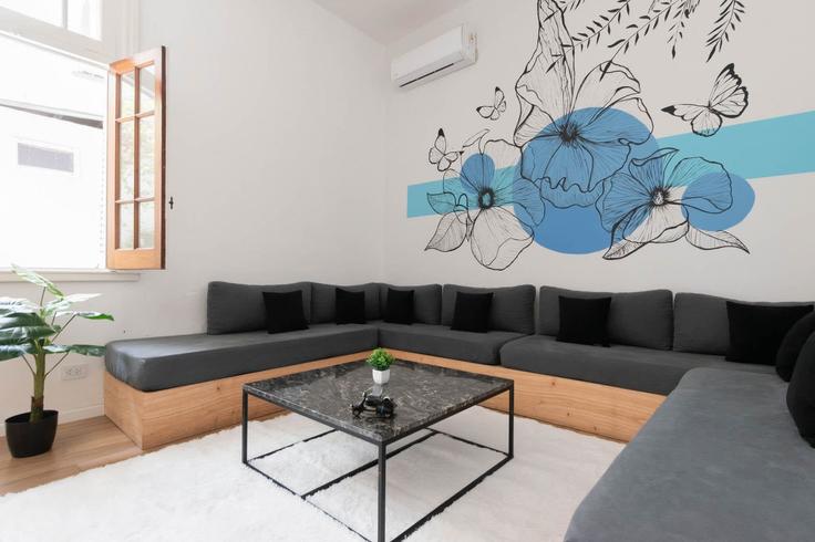 Building Guatemala - fliphaus - 1048896 - ARG adresindeki bir dairede modern mobilyalarla zarif bir şekilde tasarlanmış oturma odası Buenos Aires, Buenos Aires