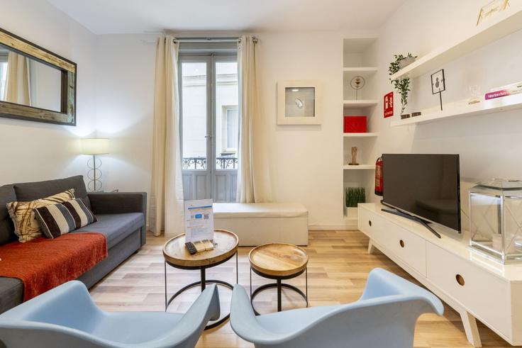 Centro, Madrid에 위치한 Building Calle de Preciados - for-you-rentals - 1264306 - MAD 아파트의 세련된 인테리어가 돋보이는 거실 Centro, Madrid에 위치한 Building Calle de Preciados - for-you-rentals - 1264306 - MAD 아파트의 세련된 인테리어가 돋보이는 거실
