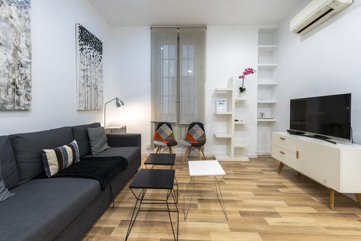 Centro, Madrid에 위치한 Building Calle de Preciados - for-you-rentals - 1264302 - MAD 아파트의 세련된 인테리어가 돋보이는 거실 Centro, Madrid에 위치한 Building Calle de Preciados - for-you-rentals - 1264302 - MAD 아파트의 세련된 인테리어가 돋보이는 거실